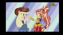 Size: 1366x768 | Tagged: safe, derpibooru import, screencap, applejack, sunset shimmer, dance magic, equestria girls, spoiler:eqg specials, clothes, dance magic (song), dancing, dress, hat, holding hands, looking at each other, ponied up