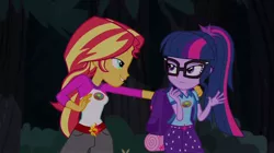 Size: 1100x618 | Tagged: safe, derpibooru import, screencap, sci-twi, sunset shimmer, twilight sparkle, equestria girls, legend of everfree, backpack, camp everfree outfits, clothes, duo, female, glasses, lidded eyes, out of context, shipping fuel, shorts, sun, tree