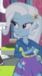 Size: 342x616 | Tagged: safe, derpibooru import, screencap, trixie, equestria girls, rainbow rocks, better than ever, canterlot high, clothes, cropped, hoodie, jacket, lidded eyes, skirt, solo