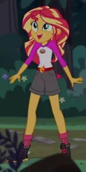 Size: 237x472 | Tagged: safe, derpibooru import, screencap, sunset shimmer, equestria girls, legend of everfree, boots, camp everfree outfits, clothes, cropped, cute, flower, legs, shimmerbetes, shorts, socks, solo, sun, tree