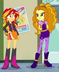 Size: 443x541 | Tagged: safe, derpibooru import, screencap, adagio dazzle, sunset shimmer, equestria girls, rainbow rocks, boots, clothes, cropped, door, electric guitar, guitar, hands behind back, high heel boots, jacket, jewelry, leather jacket, looking at each other, music notes, pendant, poster, skirt, spikes