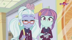 Size: 1136x638 | Tagged: safe, derpibooru import, screencap, sugarcoat, sunny flare, dance magic, equestria girls, spoiler:eqg specials, bag, blunt, bowtie, canterlot mall, clothes, confused, crossed arms, crystal prep academy uniform, crystal prep shadowbolts, duo, female, flower, flower in hair, glasses, mall, school uniform, teletoon