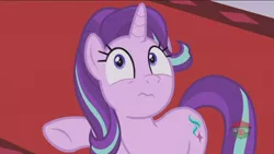 Size: 1366x768 | Tagged: safe, derpibooru import, screencap, starlight glimmer, pony, unicorn, a royal problem, canterlot castle, carpet, expression, oh crap, raised hoof, red carpet, solo, treehouse logo, wavy mouth