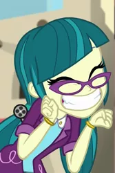 Size: 683x1020 | Tagged: safe, derpibooru import, screencap, juniper montage, equestria girls, movie magic, spoiler:eqg specials, ^^, adorkable, baubles, blazer, bracelet, clothes, cropped, cute, cute little fangs, dork, eyes closed, fangs, female, glasses, grin, hair tie, happy, india movie set, jewelry, junibetes, pigtails, shirt, smiling, solo, squee, standing, twintails