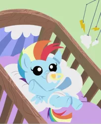 Size: 531x651 | Tagged: safe, derpibooru import, rainbow dash, pony, parental glideance, baby, baby dash, baby pony, crib, diaper, foal, pacifier, solo