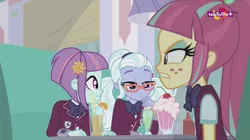 Size: 1136x638 | Tagged: safe, derpibooru import, screencap, sour sweet, sugarcoat, sunny flare, dance magic, equestria girls, spoiler:eqg specials, angry, bowtie, cherry, clothes, crystal prep academy uniform, drinking, female, food, glasses, orange, school uniform, smoothie, straw, teletoon, trio