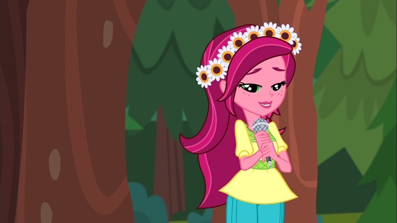 Size: 1100x618 | Tagged: safe, derpibooru import, screencap, gloriosa daisy, equestria girls, legend of everfree, female, lidded eyes, magical geodes, microphone, solo