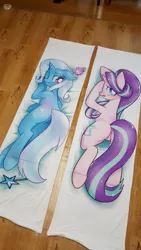 Size: 540x960 | Tagged: safe, artist:renokim, derpibooru import, starlight glimmer, trixie, pony, unicorn, blushing, body pillow, body pillow design, cup, cute, diatrixes, female, glimmerbetes, looking at you, looking back, mare, one eye closed, pixiv, plot, solo, teacup, wand