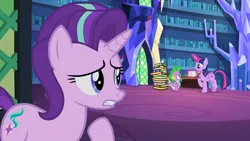 Size: 1920x1080 | Tagged: safe, derpibooru import, screencap, spike, starlight glimmer, twilight sparkle, twilight sparkle (alicorn), alicorn, dragon, pony, unicorn, every little thing she does, book, bookshelf, female, flash cards, gritted teeth, library, magic, male, mare, raised hoof, telekinesis, twilight's castle, twilight's castle library, worried