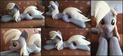 Size: 2853x1308 | Tagged: safe, artist:rosamariposacrafts, derpibooru import, derpy hooves, pony, irl, life size, photo, plushie, prone, solo