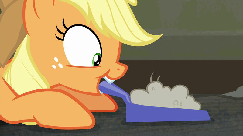 Size: 1280x720 | Tagged: safe, derpibooru import, screencap, applejack, earth pony, pony, the saddle row review, cute, dustpan, female, freckles, looking down, mare, mouth hold, solo