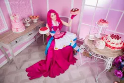 Size: 1600x1067 | Tagged: artist:evange, cake, clothes, cosplay, costume, derpibooru import, dress, food, gala dress, human, humanized, irl, irl human, looking at you, photo, pinkie pie, safe, sitting, smiling, solo, table