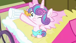 Size: 1280x720 | Tagged: safe, derpibooru import, screencap, princess flurry heart, alicorn, pony, a flurry of emotions, baby carriage, bottle, cloth diaper, cute, diaper, flurrybetes, hoof hold, kneeling, safety pin, solo, spread wings, wings