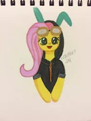 Size: 1024x1365 | Tagged: safe, artist:bleuey, derpibooru import, fluttershy, pegasus, pony, bunny ears, clothes, costume, dangerous mission outfit, female, goggles, happy, hoodie, looking at you, mare, open mouth, signature, simple background, smiling, solo, traditional art, white background