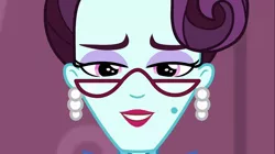 Size: 1100x618 | Tagged: safe, derpibooru import, screencap, principal abacus cinch, equestria girls, friendship games, ear piercing, earring, female, glasses, jewelry, looking at you, piercing, solo