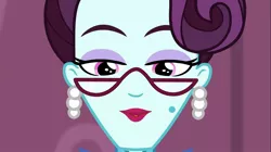 Size: 1100x618 | Tagged: safe, derpibooru import, screencap, principal abacus cinch, equestria girls, friendship games, ear piercing, earring, female, glasses, jewelry, looking at you, open mouth, piercing, solo