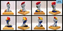 Size: 3601x1788 | Tagged: safe, artist:prodius, derpibooru import, rainbow dash, pony, chest fluff, commission, cookie, craft, cute, dashabetes, figurine, foal, food, irl, photo, sculpey, sculpture, show accurate, traditional art