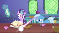 Size: 1280x720 | Tagged: safe, derpibooru import, screencap, starlight glimmer, trixie, pony, all bottled up, cup, icing bag, magic, teacup