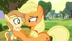 Size: 2277x1313 | Tagged: safe, artist:velveagicsentryyt, derpibooru import, applejack, oc, oc:apple heart, pony, baby, baby pony, female, filly, foal, holding a pony, mare, mother and daughter, offspring, parent:applejack, parent:caramel, parents:carajack