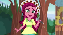 Size: 1280x720 | Tagged: safe, derpibooru import, screencap, gloriosa daisy, equestria girls, legend of everfree, awkward, magical geodes, microphone, poker face, smiling, solo