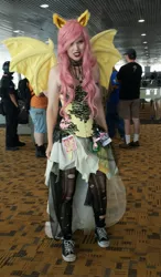 Size: 1711x2922 | Tagged: safe, derpibooru import, fluttershy, bat pony, human, bronycon, bronycon 2017, clothes, contact lens, converse, corset, cosplay, costume, flutterbat, irl, irl human, photo, race swap, ripped stockings, shoes, sneakers