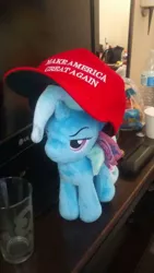 Size: 540x960 | Tagged: safe, derpibooru import, trixie, pony, unicorn, 4de, female, irl, maga hat, make america great again, mare, mouthpiece, photo, plushie, politics, solo