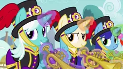 Size: 1365x767 | Tagged: safe, derpibooru import, screencap, clarion call, cornetta, unnamed pony, pony, unicorn, triple threat, background pony, clothes, female, glowing horn, hat, levitation, magic, magic aura, mare, musical instrument, telekinesis, top hat, trumpet, uniform