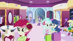 Size: 1278x718 | Tagged: safe, derpibooru import, screencap, amethyst star, bon bon, cheerilee, derpy hooves, lyra heartstrings, rarity, roseluck, sophisticata, sweetie drops, equestria girls, life is a runway, rainbow rocks, boutique, clothes, food, mannequin, mirror, muffin, shoes, shopping, shopping bags