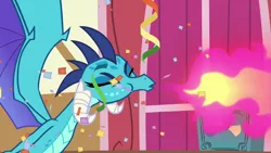 Size: 1280x720 | Tagged: confetti, derpibooru import, dragon, dragoness, eyes closed, female, fire, fire breath, pink fire, princess ember, safe, screencap, sneezing, solo, streamers, triple threat