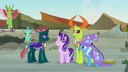 Size: 1920x1080 | Tagged: safe, derpibooru import, screencap, pharynx, starlight glimmer, thorax, trixie, changedling, changeling, pony, unicorn, to change a changeling, cape, clothes, discovery family logo, hat, king thorax, prince pharynx, trixie's cape, trixie's hat