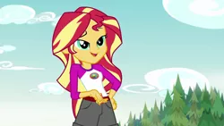 Size: 1280x720 | Tagged: safe, derpibooru import, screencap, sunset shimmer, equestria girls, legend of everfree, camp everfree outfits, clothes, female, open mouth, scenery, shorts, solo, tree