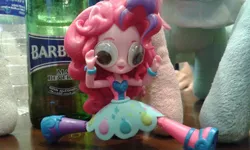 Size: 1024x616 | Tagged: safe, derpibooru import, photographer:aemantaslim, pinkie pie, equestria girls, doll, equestria girls minis, eqventures of the minis, googly eyes, irl, photo, rainbow rocks outfit, silly human, toy