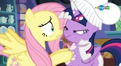 Size: 854x470 | Tagged: safe, derpibooru import, screencap, fluttershy, twilight sparkle, twilight sparkle (alicorn), alicorn, pony, a health of information, carousel (tv channel), chef's hat, duo, hat