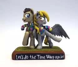 Size: 746x641 | Tagged: safe, artist:ubrosis, derpibooru import, derpy hooves, ditzy doo, doctor whooves, time turner, earth pony, pegasus, pony, clothes, doctorderpy, female, male, mare, scarf, sculpey, sculpture, shipping, stallion, straight, traditional art