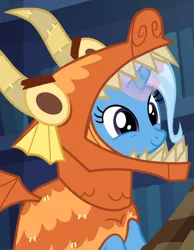 Size: 578x746 | Tagged: safe, derpibooru import, screencap, trixie, dragon, pony, unicorn, uncommon bond, adorable face, best dragon, board game, clothes, costume, cropped, cute, daaaaaaaaaaaw, diatrixes, dragon costume, dragon pit, female, glowing horn, hnnng, mare, smiling, solo