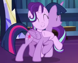 Size: 840x680 | Tagged: safe, derpibooru import, screencap, starlight glimmer, twilight sparkle, twilight sparkle (alicorn), alicorn, pony, unicorn, uncommon bond, book, cropped, cute, duo, duo female, eyes closed, female, glimmerbetes, happy, hug, leaning, raised hoof, smiling, twiabetes, twilight's castle, twilight's castle library