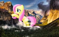 Size: 1920x1200 | Tagged: safe, artist:flutterbatismagic, derpibooru import, fluttershy, pony, california, destruction, exploitable meme, funny, giant pony, giantess, huge, irl, macro, macro/micro, meme, mountain, mountain range, nature, nature is so fascinating, photo, photomanipulation, ponies in real life, rearing, silly, silly pony, solo, sunset, waterfall