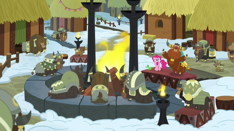 Size: 1280x720 | Tagged: safe, derpibooru import, screencap, gummy, pinkie pie, prince rutherford, pony, yak, not asking for trouble, calf, cloven hooves, crowd, crown, fire, firepit, horn ring, hut, jewelry, pit, regalia, snow, yak calf, yakyakistan, yickslubertfest