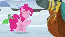 Size: 1280x720 | Tagged: safe, derpibooru import, screencap, gummy, pinkie pie, prince rutherford, pony, yak, not asking for trouble, biting, eyes closed, smiling, snow, tail bite