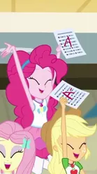 Size: 304x547 | Tagged: safe, derpibooru import, screencap, applejack, fluttershy, pinkie pie, equestria girls, equestria girls series, the finals countdown, cropped, eyes closed, female, geode of sugar bombs, geode of super strength, grades, happy, magical geodes, smiling, success
