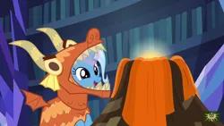 Size: 1280x720 | Tagged: safe, derpibooru import, screencap, trixie, pony, unicorn, uncommon bond, board game, cute, diatrixes, dragon costume, dragon pit, female, glowing horn, mare, open mouth