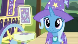 Size: 1280x720 | Tagged: safe, derpibooru import, screencap, trixie, pony, unicorn, uncommon bond, c:, cape, card, clothes, cute, deck of cards, diatrixes, female, hat, implied sunburst, levitation, magic, magic trick, mare, offscreen character, playing card, smiling, solo, telekinesis, trixie's cape, trixie's hat, trixie's wagon