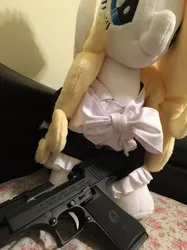 Size: 2000x2668 | Tagged: safe, derpibooru import, oc, oc:solari melody, unofficial characters only, pegasus, pony, clothes, desert eagle, edgy, female, gun, handgun, irl, maid, mare, photo, pistol, plushie, smiling, solo, weapon