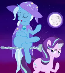 Size: 1600x1790 | Tagged: safe, artist:aerthmanolo, derpibooru import, starlight glimmer, trixie, pony, unicorn, broom, cape, clothes, female, hat, levitation, magic, moon, night, nightmare night, smug, starlight is not amused, telekinesis, trixie's cape, trixie's hat, unamused