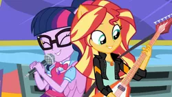 Size: 1280x720 | Tagged: safe, derpibooru import, screencap, sci-twi, sunset shimmer, twilight sparkle, eqg summertime shorts, equestria girls, get the show on the road, bowtie, bus, clothes, cute, duo, electric guitar, eyes closed, flying v, geode of empathy, geode of telekinesis, glasses, guitar, jacket, leather jacket, microphone, ponied up, scitwilicorn, shimmerbetes, singing, sunset shredder, twiabetes, wings