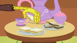 Size: 1280x720 | Tagged: carrot-ginger sandwich, cup, derpibooru import, discord, discordant harmony, food, safe, sandwich, sandwich crust, screencap, solo, table, teacup, teapot