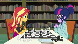 Size: 1280x720 | Tagged: safe, derpibooru import, screencap, sci-twi, sunset shimmer, twilight sparkle, equestria girls, equestria girls series, the finals countdown, canterlot high, chess, chessboard incorrectly oriented, clothes, glasses, hoodie, library