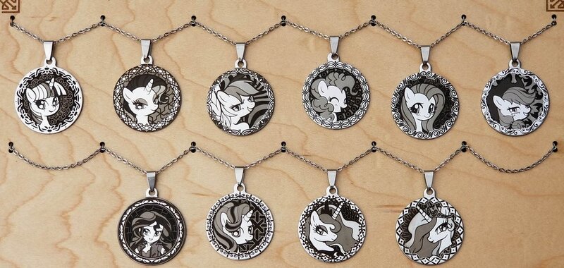 Size: 1000x475 | Tagged: safe, artist:lindsay cibos, derpibooru import, applejack, fluttershy, pinkie pie, princess celestia, princess luna, rainbow dash, rarity, starlight glimmer, sunset shimmer, twilight sparkle, equestria girls, irl, jewelry, merchandise, pendant, photo