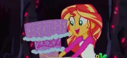 Size: 901x414 | Tagged: safe, derpibooru import, edit, edited screencap, screencap, sunset shimmer, comic:a new change, equestria girls, legend of everfree, cake, cropped, discovery kids, food, pregnant, pregnant edit, smiling, solo, teen pregnancy