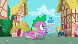 Size: 1279x720 | Tagged: safe, derpibooru import, screencap, spike, dragon, secret of my excess, cupcake, food, impossibly long tongue, long tongue, ponyville, sapphire, sapphire cupcake, solo, tongue out